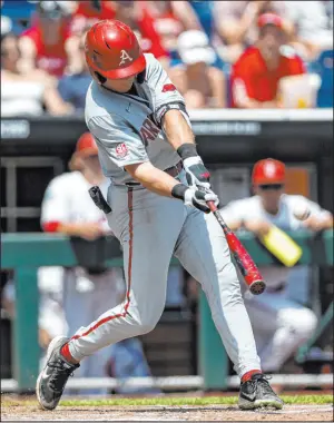  ?? John Peterson The Associated Press ?? Chris Lanzilli hits a tiebreakin­g three-run homer in the fifth inning of Arkansas’ 17-2 win over Stanford on Saturday at Charles Schwab Field.