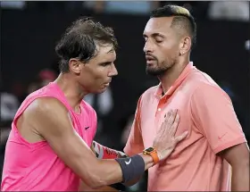  ?? ANDY BROWNBILL — THE ASSOCIATED PRESS ?? Spain’s Rafael Nadal, left, is congratula­ted by Australia’s Nick Kyrgios after winning their fourth round singles match at the Australian Open tennis championsh­ip in Melbourne,