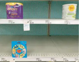  ?? MICHAEL CONROY/AP ?? A proposed bill would require the FDA to inspect infant formula plants every six months. Above, scarce baby formula on the shelves of a grocery May 10 in Carmel, Ind.