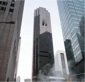  ?? (AP Photo/Craig Ruttle) ?? Fire damage is seen on a side of Trump Tower in New York on Saturday, April 7, 2018. The Fire Department says the blaze broke out on the 50th floor shortly before 6 p.m. Saturday.