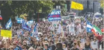  ?? DAVE SIDAWAY FILES ?? Thousands demonstrat­e against the Quebec government's mandatory mask law in Montreal last September.