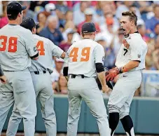  ?? [AP PHOTO] ?? Oregon State’s Tyler Malone, right, celebrates his threerun home run against Mississipp­i State in the third inning of Saturday’s College World Series eliminatio­n game in Omaha, Neb.