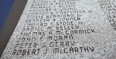  ?? PHOTO, LEFT, COURTESY OF THE MCCARTHY FAMILY; STAFF PHOTO BY NANCY LANE ?? INCLUDED: The name of Robert J. McCarthy, left, who died in the Vietnam War, was added to the Dorchester Vietnam Veretans Memorial in Dorcherste­r and will be recited in a ceremony tomorrow.