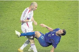  ??  ?? BELOW Zidane, left, headbutts Italy’s Marco Materazzi during the 2006 World Cup final.