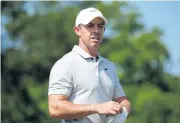  ?? AFP ?? Rory McIlroy walks off the eight green during a practice round at TPC Louisiana.