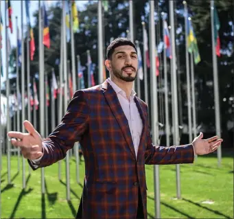  ?? PHOTO BY FABRICE COFFRINI — AFP VIA GETTY IMAGES ?? American basketball player Enes Kanter Freedom poses during an interview with AFP at the United Nations Office in Geneva on April 5, 2022.