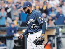  ?? WALLY SKALIJ LOS ANGELES TIMES ?? Brewers reliever Jeremy Jeffress allowed Los Angeles third baseman Justin Turner’s go-ahead homer in Game 2 in Milwaukee on Saturday.