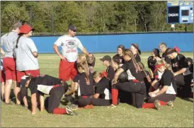  ?? ALEX FARRER / staff ?? Sonoravill­e head coach Chad Hayes (center) talks to his team following their loss to Ringgold on Monday.