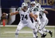  ?? TOM GANNAM — THE ASSOCIATED PRESS FILE ?? Jets center Nick Mangold drops back in protection during game against Rams in 2012. Mangold announced his retirement from playing football after 11 seasons in which he establishe­d himself as one of the NFL’s best at his position.