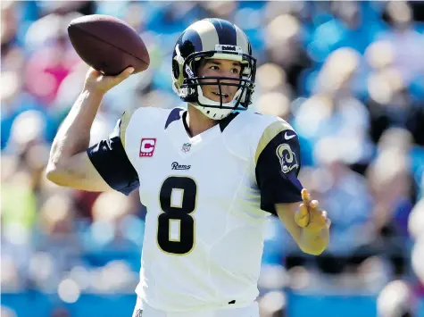  ?? BOB LEVERONE/The Associated Press files ?? Quarterbac­k and former first-overall pick Sam Bradford is headed from the St. Louis Rams to the Philadelph­ia Eagles for Nick Foles.
