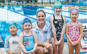  ?? Picture: STEWART MCLEAN ?? IN THE SWIM: Bronte Campbell with Seon Yoo, Violet Luckie, Siena Goulding, and Jiwoo Kim at Tobruk Pool.