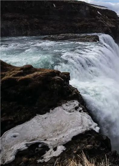  ??  ?? Gullfoss, the “Golden Waterfall,” froths into the Hvita River gorge in Iceland.