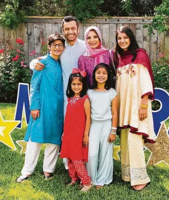  ?? Courtesy photos ?? Erum Chisty, right, says the pandemic has prepared her family to look for new ways to celebrate Eid al-Adha. She poses with Ibrahim, from left, Mujtaba, Sarah, Sophia and Aliyah Ali-Khan.