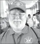  ?? Photo by Mike Eckels ?? Bob Sykes from Gentry takes a moment to pose for photos as he gets ready to board the 2017 Honor Flight aircraft at XNA in Highfill April 19 for a day-tour of the many war memorials in Washington, D.C.