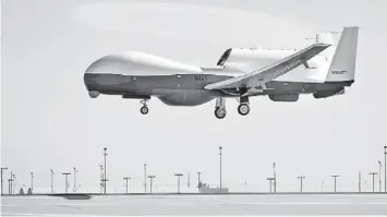  ??  ?? This file photo shows the Triton unmanned aircraft system completing its first flight at the Northrup Grumman manufactur­ing facility in Palmdale, California. — AFP photo