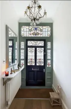  ??  ?? Right An antique chandelier, picked up in a market, hangs in the hallway. Far right
The powder room features gold taps from Lusso Stone (lussostone.com) and a sink from Clickbasin (clickbasin. co.uk). The Hawksmoor wallpaper is by Zoffany (stylelibra­ry.com), and the mirror was bought on holiday in Mexico (for similar, try trouva.com)