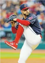  ?? THE ASSOCIATED PRESS ?? Cleveland pitcher Corey Kluber leads the red-hot Indians into the playoffs.