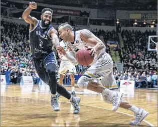  ??  ?? In this Dec 1. 2017 file photo, St. John’s Edge guard Carl English drives past Dwayne Smith (32) of the Niagara River Lions during National Basketball League of Canada action at Mile One Centre in St. John’s. Despite having a relatively short time to...