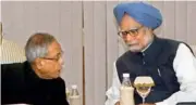  ?? — PTI ?? Prime Minister Manmohan Singh talks to finance minister Pranab Mukherjee at an all-party meeting of Rajya Sabha members on the Lokpal Bill, at the PM House in New Delhi on Friday. Besides Union ministers like P. Chidambara­m and A.K. Antony, Arun...