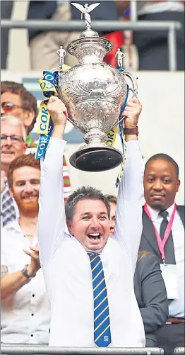  ??  ?? Steve Price lifts the Challenge Cup trophy in 2019