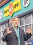  ?? JIM THOMPSON/JOURNAL ?? Mayor Tim Keller talks about free parking at metered spaces throughout the city during the Christmas shopping season.