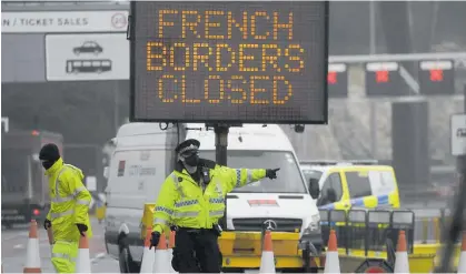  ?? Photo / AP ?? A growing number of countries halted air travel from Britain and France has banned trucks for 48 hours.