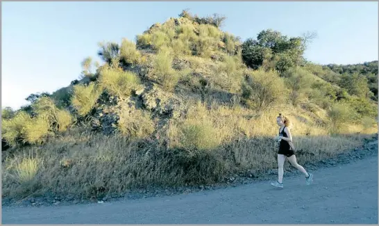  ?? Photograph­s by Allen J. Schaben Los Angeles Times ?? SAN VICENTE Mountain Park on Mulholland Drive isn’t just a good place to run or bike. The former military outpost is a spot to catch up on L.A.’s Cold War history.