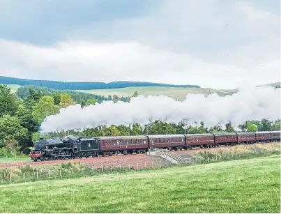  ??  ?? The Black Five steam locomotive travelling along the Borders Railway.