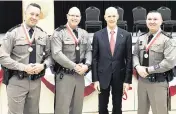  ?? Miami ?? Former Florida Highway Patrol Trooper Michael Lipari, left, received the Governor’s Veterans Service Award from Gov. Rick Scott in 2018.