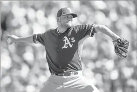  ?? ROB TRINGALI/GETTY IMAGES ?? Jesse Hahn boasts a 12-to-6 curveball that A’s pitching coach Curt Young calls “electric.” Hahn’s father, who helped him learn the pitch, calls it “old-school.”