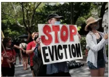  ?? Spencer Platt/Getty Images ?? Activists hold a protest against evictions near City Hall on Aug. 11 in New York City.