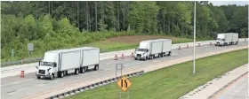  ?? FEDEX ?? FedEx and Volvo Trucks North American have been testing a trucking technology called platooning on the Triangle Expressway in North Carolina.