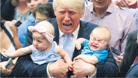  ?? Picture / AP ?? He makes them howl — Donald Trump holds Evelyn Keane, left, and Kellen Campbell of Castle Rock, Colorado, during a rally.