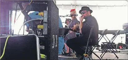  ?? (RUSSELL WANGERSKY/TC MEDIA) ?? P.E.I.’s Dennis Ellsworth performs at Stanfest in Canso.