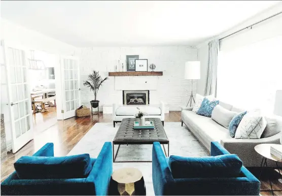  ?? PHOTOS: SMITHERICK­SON DESIGNS ?? Bright colours, like this smattering of cobalt blue, added interest to this redesign of a living room in Willow Park by SmithErick­son Designs.