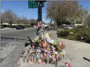  ?? ?? A growing memorial at the intersecti­on of College and Court Street honoring Tina Vital, who passed away in a major three-car accident Saturday, April 8.