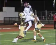  ?? AUSTIN HERTZOG - DIGITAL FIRST MEDIA ?? Pottsgrove’s Jimai Springfiel­d (1) is sandwiched between a pair of Bethlehem Catholic defensive backs on an incomplete pass in the end zone.