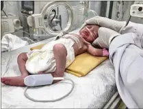  ?? MOHAMMAD JAHJOUH/AP ?? Sabreen Jouda was delivered prematurel­y after her mother, 30 weeks’ pregnant, was killed in an Israeli airstrike. She was kept in an incubator in a Rafah hospital but died Thursday.