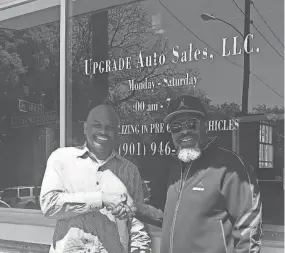  ?? TONYAA WEATHERSBE­E/THE COMMERCIAL APPEAL ?? Eric Mhoon and Marvin “MC” Coleman stand outside Mhoon's used car dealership on Mississipp­i Boulevard and Crump Avenue. The men met while doing time on federal drug charges, and they hope their business success can inspire youths to avoid prison.