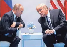  ?? EVAN VUCCI, AP ?? President Trump speaks with Russian President Vladimir Putin at the G-20 summit July 7 in Hamburg. Trump wants more cooperatio­n with Russia on counterter­rorism.