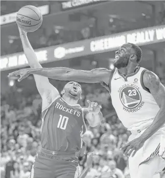  ?? Michael Ciaglo / Houston Chronicle ?? Warriors forward Draymond Green, right, was up to the task of guarding a variety of Rockets on Sunday in Game 3, including Eric Gordon.