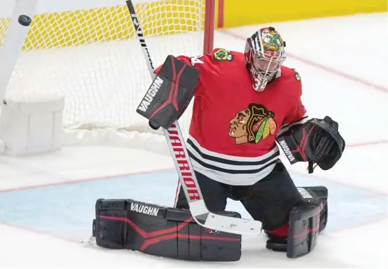  ?? LM OTERO/AP ?? Blackhawks goalie Petr Mrazek suffered the ignominy of surrenderi­ng four goals in 10 minutes of the third period in a stinging loss to the Stars on Wednesday.