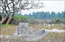  ??  ?? The cemetery at McCluskieg­anj lies in neglect, with unmarked graves, a partial boundary wall and gate that has been stolen. The cemetery has historic and sentimenta­l value for those whose loved ones are buried here, say locals. Efforts are on to...