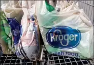  ?? AP File Photo/ROGELIO V. SOLIS ?? Kroger’s decision to phase out plastic bags is a mixed bag.