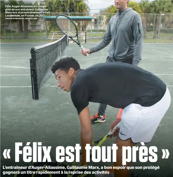  ?? PHOTO D’ARCHIVES, AGENCE QMI ?? Félix Auger-aliassime en compagnie de son entraîneur Guillaume Marx lors d’un entraîneme­nt à Fort Lauderdale, en Floride, en 2017.