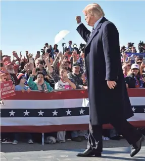  ?? NICHOLAS KAMM/AFP/GETTY IMAGES ?? President Donald Trump greets the crowd Saturday at a rally in Elko, Nev.