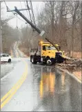  ?? ?? A town truck crashed into a utility pole on Plumtrees Road in Newtown around 7:30 a.m. Wednesday due to icy conditions. It was one of several crashes that the Dodgingtow­n Volunteer Fire Company No. 1 responded to in Newtown on Wednesday.