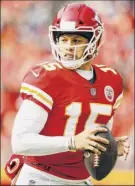  ?? David Eulitt / Getty Images ?? Chiefs QB Patrick Mahomes leads the league in passing yards, and broke a team record with his Nflbest 31st TD pass of the season.