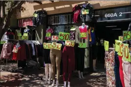  ?? ADRIANA HELDIZ — CALMATTERS ?? A clothing store in the San Ysidro neighborho­od of San Diego.