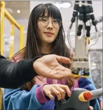  ?? BALAZS GARDI — THE NEW YORK TIMES ?? Tiana Ton Nu, a robotics applicatio­ns engineer at Covariant, at the company's headquarte­rs in Emeryville on March 8.